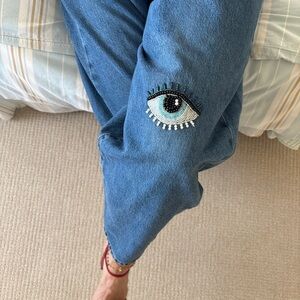 Frame low slung barrel hand embroidered Evil Eye Detail Jeans